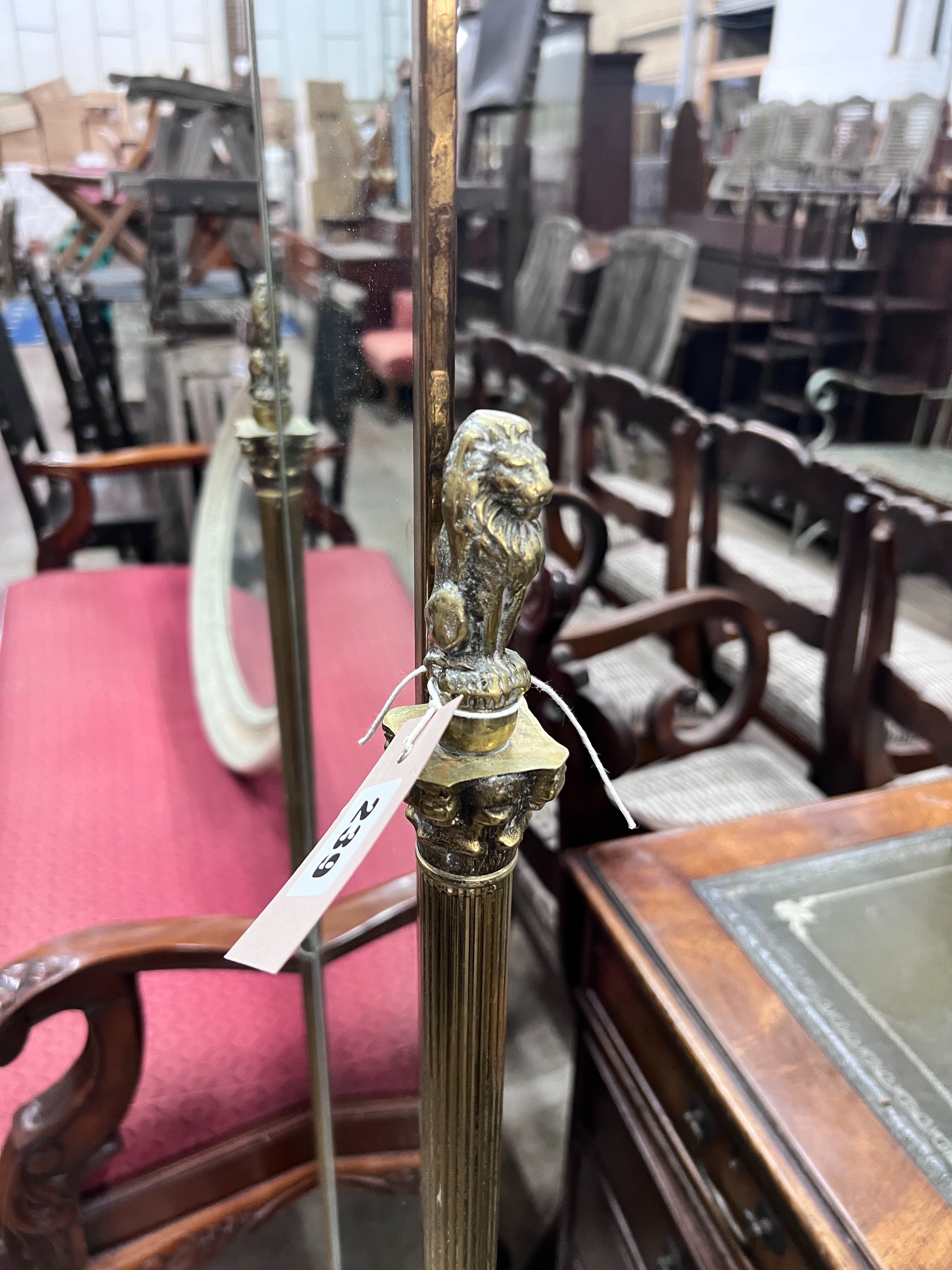 A brass cheval mirror, height 138cm *Please note the sale commences at 9am.